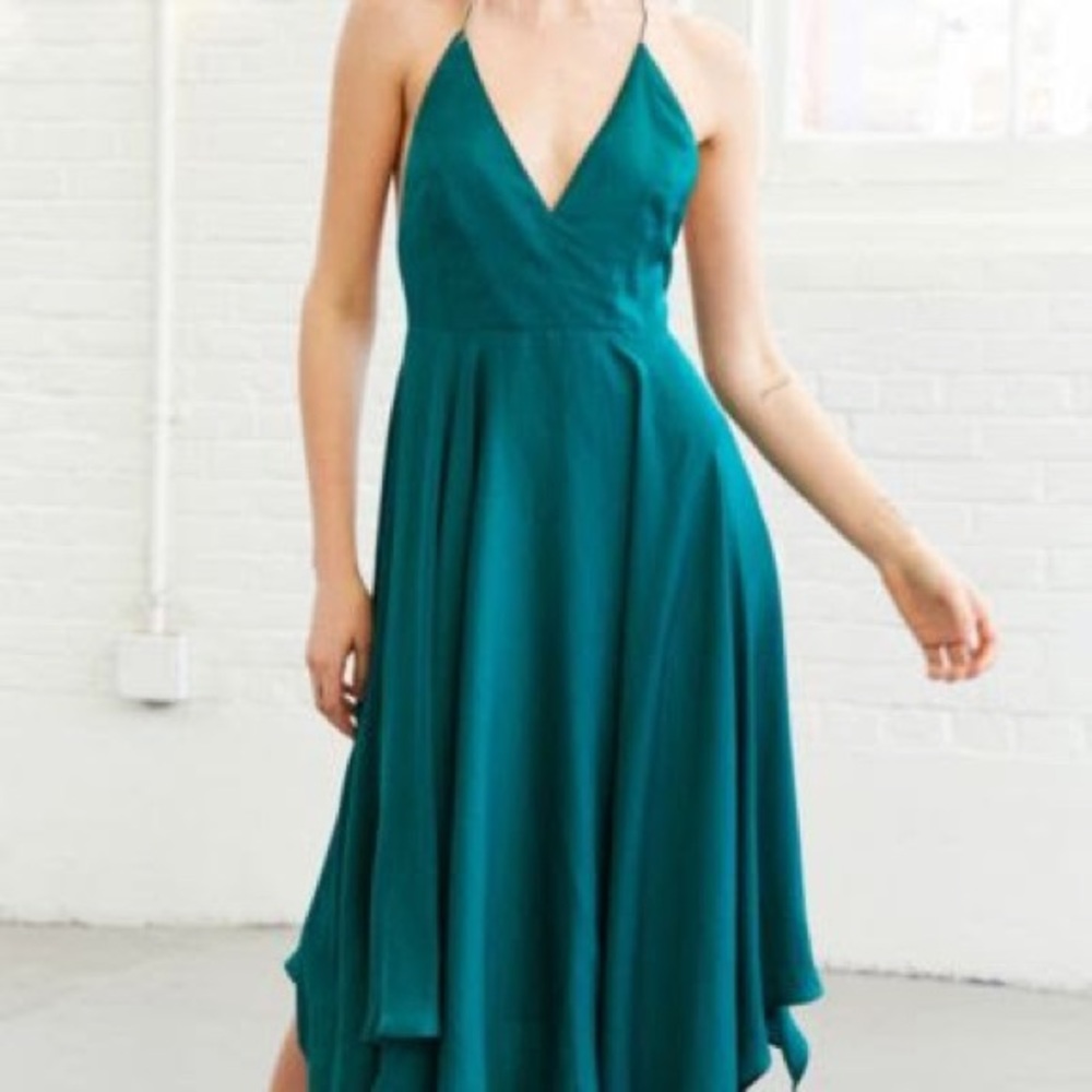 Flowy green midi dress with deep V